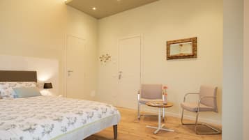 Comfort Room, Ensuite, Garden View | Memory-foam beds, individually decorated, individually furnished, desk