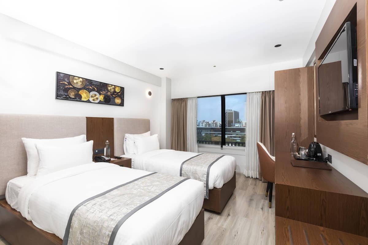 Premium bedding, in-room safe, blackout drapes, iron/ironing board