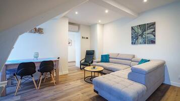 Appartement Prestige | Coin séjour | Télévision