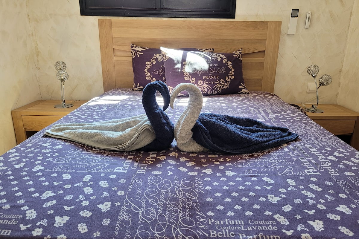 2 bedrooms, blackout drapes, iron/ironing board, WiFi (free)