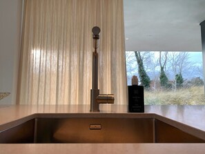 Shower, hair dryer, towels, toilet paper