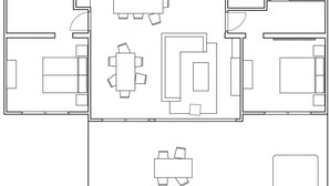 A hotel floor plan with multiple rooms, a central dining area, and a small kitchen. - Royal Forest Pet Friendly Lodge (Coleford)