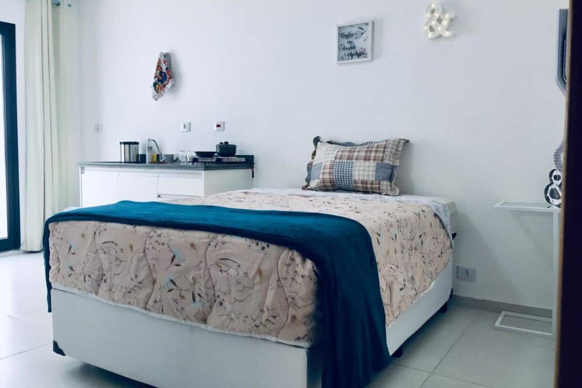 Desk, laptop workspace, free WiFi, bed sheets
