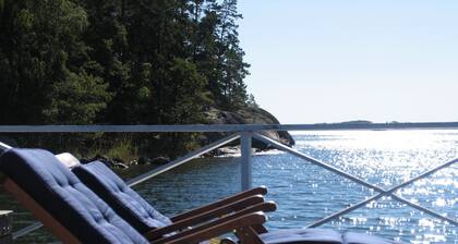 Seaside century house with beautiful sunset and big jetty with sauna