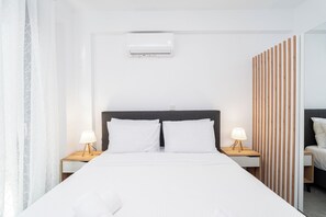 Tabla de planchar con plancha, wifi gratis y ropa de cama 