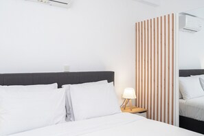 Tabla de planchar con plancha, wifi gratis y ropa de cama 