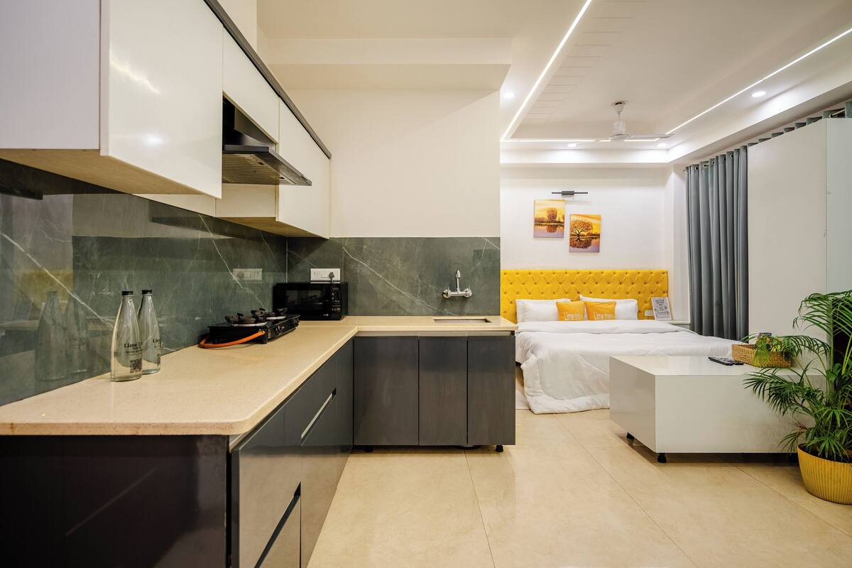Deluxe Studio | Premium bedding, desk, laptop workspace, iron/ironing board