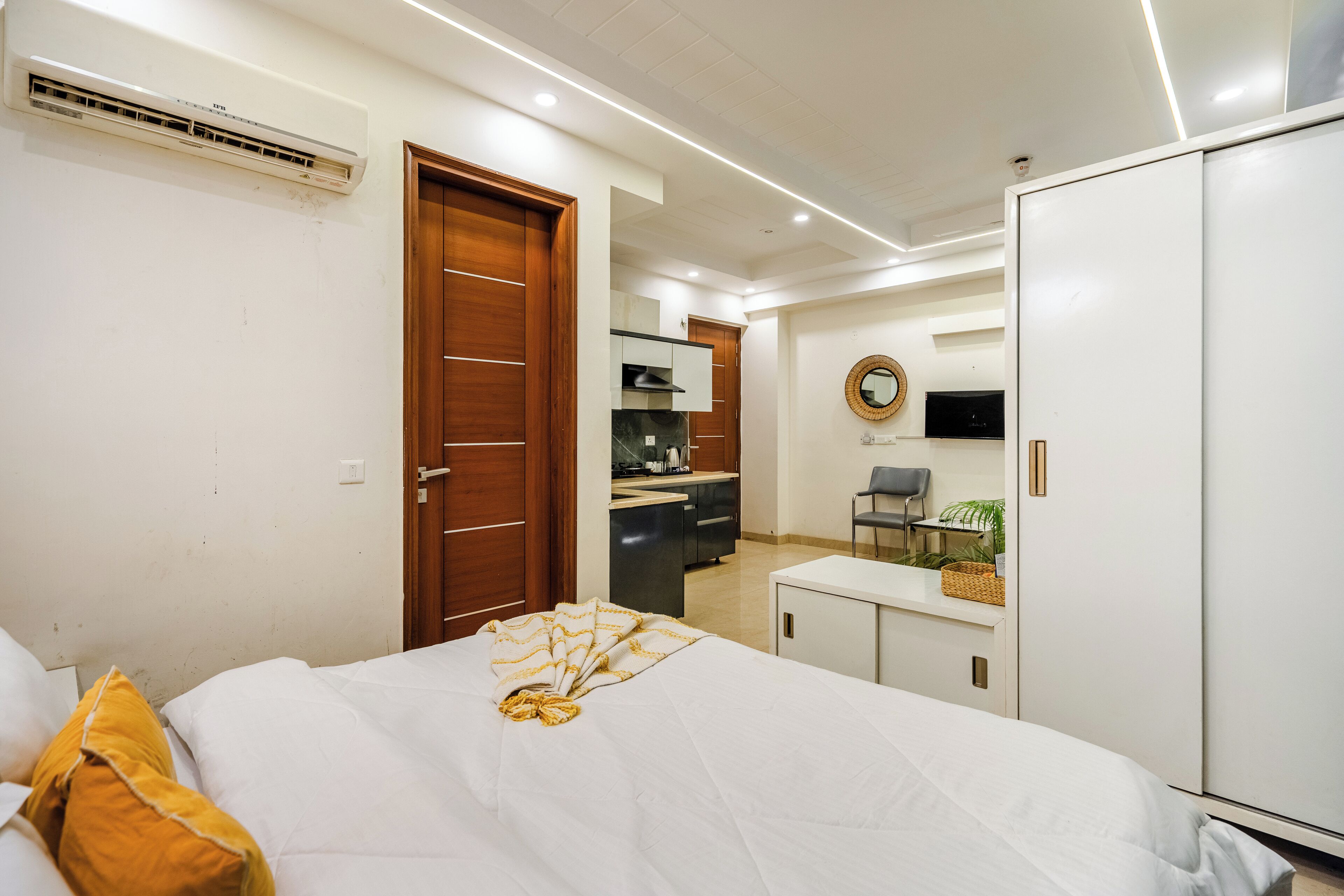 Deluxe Studio | Premium bedding, desk, laptop workspace, iron/ironing board