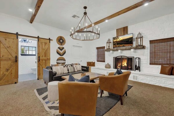 Smart TV, fireplace, books