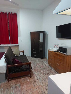 Habitación Grand | Cortinas opacas, tabla de planchar con plancha, wifi gratis