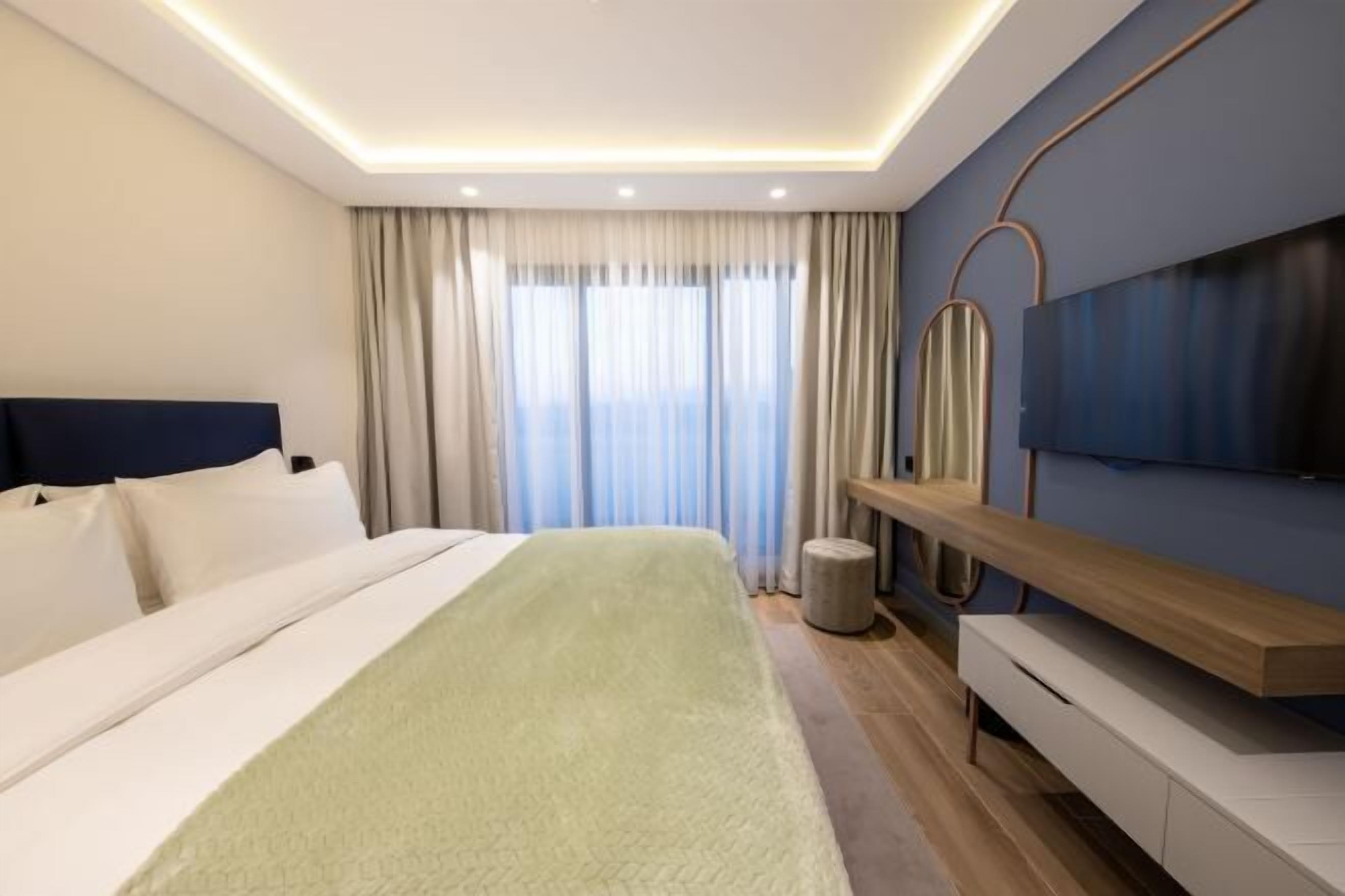 Premium bedding, down duvets, Select Comfort beds, minibar