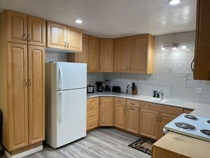 Fridge, microwave, coffee/tea maker, toaster