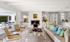 Smart TV, fireplace, books, offices