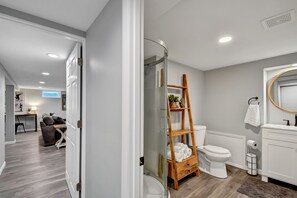 Shower, hair dryer, towels, soap