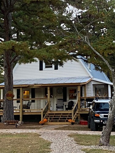 Rustic cabin on 80 acres with access to hiking and ATV trails.