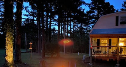 Rustic cabin on 80 acres with access to hiking and ATV trails.