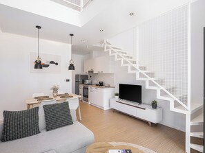 Deluxe Suite, 1 Queen Bed with Sofa bed, Pool View | Living area | 43-inch Smart TV with digital channels, TV, Netflix