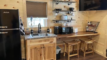 Fridge, microwave, coffee/tea maker, toaster