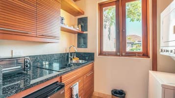 Coffee/tea maker, fridge, toaster, cookware/dishes/utensils