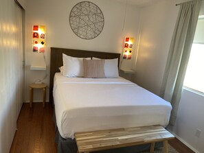 2 habitaciones, tabla de planchar con plancha y cuna de viaje