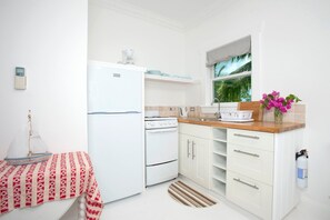 Villa, 4 Bedrooms | Private kitchen | Fridge, oven, coffee/tea maker, toaster