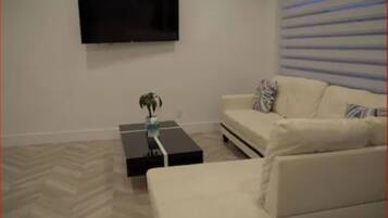 60-inch Smart TV with digital channels, TV, streaming services