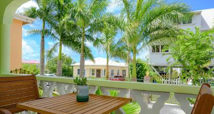 Two bedroom, 2 bathroom house in a tropical palm and garden setting.