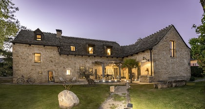 La Case à Tom with enclosed wooded park, private swimming pool, children's playground in Lozère