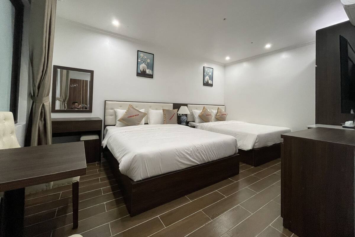 Habitación cuádruple Premium | Sábanas de algodón egipcio y ropa de cama de alta calidad