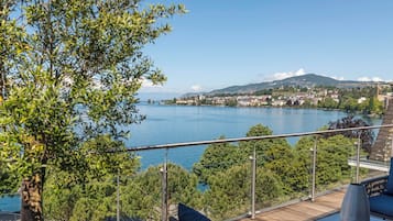 Suite, vistas al lago | 1 dormitorio, tabla de planchar con plancha, wifi gratis y ropa de cama