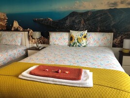 Premium Triple Room, Multiple Beds, Ensuite, Garden View | Premium bedding, down comforters, individually decorated