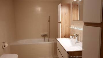 Shower, towels, soap, shampoo