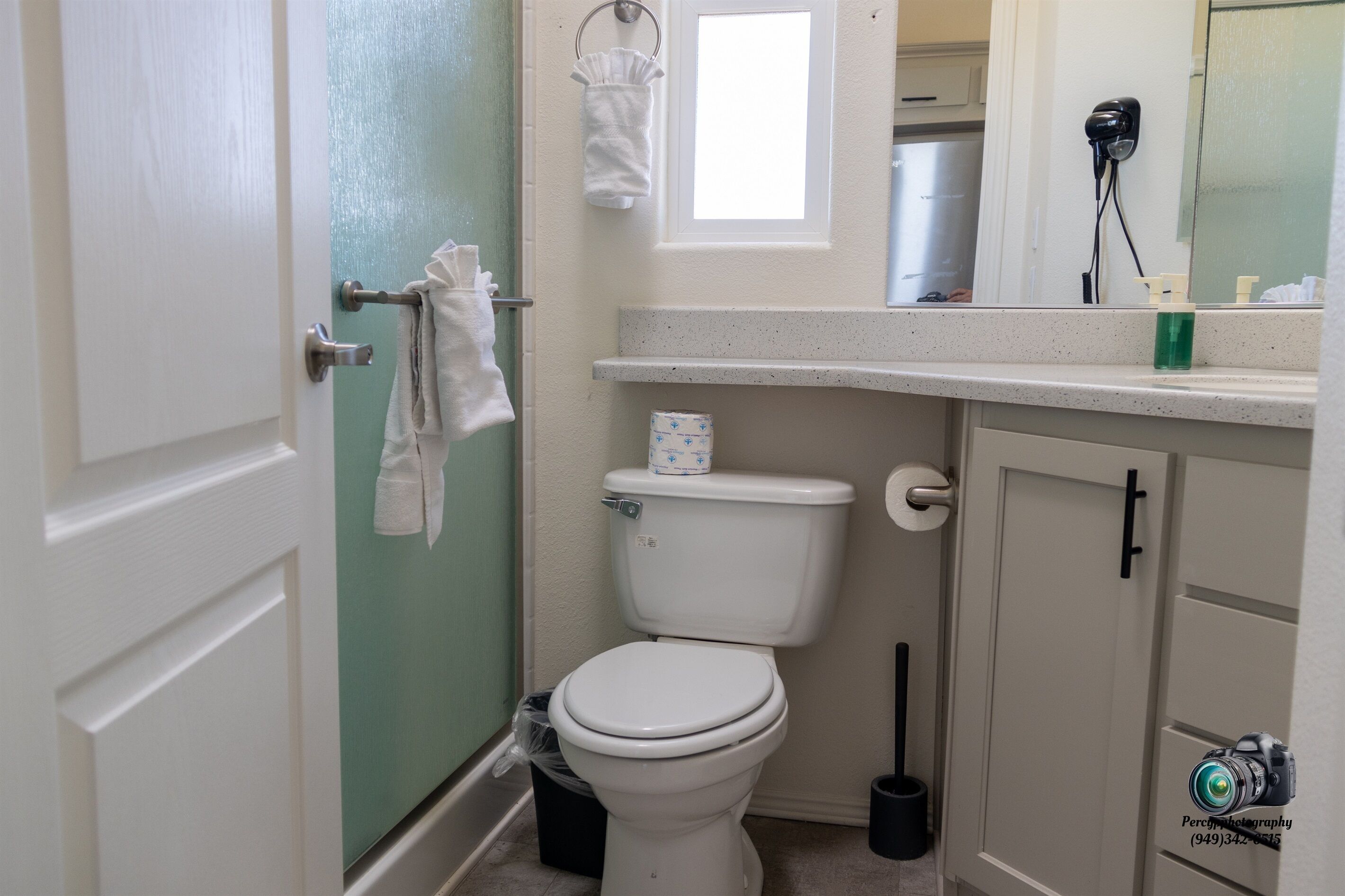 Shower, hair dryer, towels