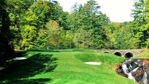 A golf course with bunkers, a waterfall, and a stone bridge. - Lakeside Serenity, Lakeside Serenity (Jackson County)