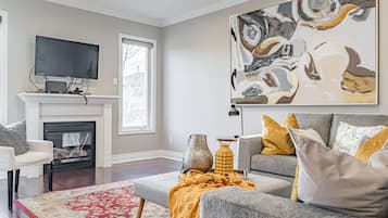 Luxury Villa | Living area | 55-inch Smart TV with digital channels, TV, fireplace