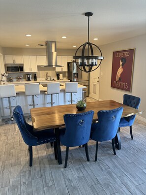 Enjoy cooking and dining in this well-equipped kitchen with a dining table for four.