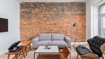 One-bed Premium Loft | Living area | 30-inch Smart TV with digital channels, TV