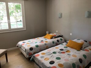 4 bedrooms, iron/ironing board, travel cot, WiFi