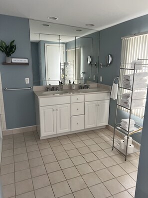 Shower, hair dryer, towels, toilet paper