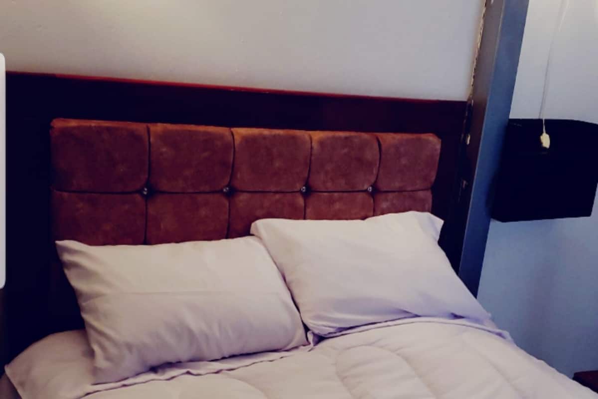 Habitación individual básica | Ropa de cama