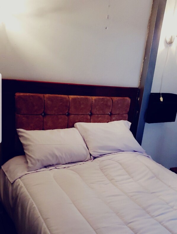 Basic Single Room | 1 bedroom, bed sheets