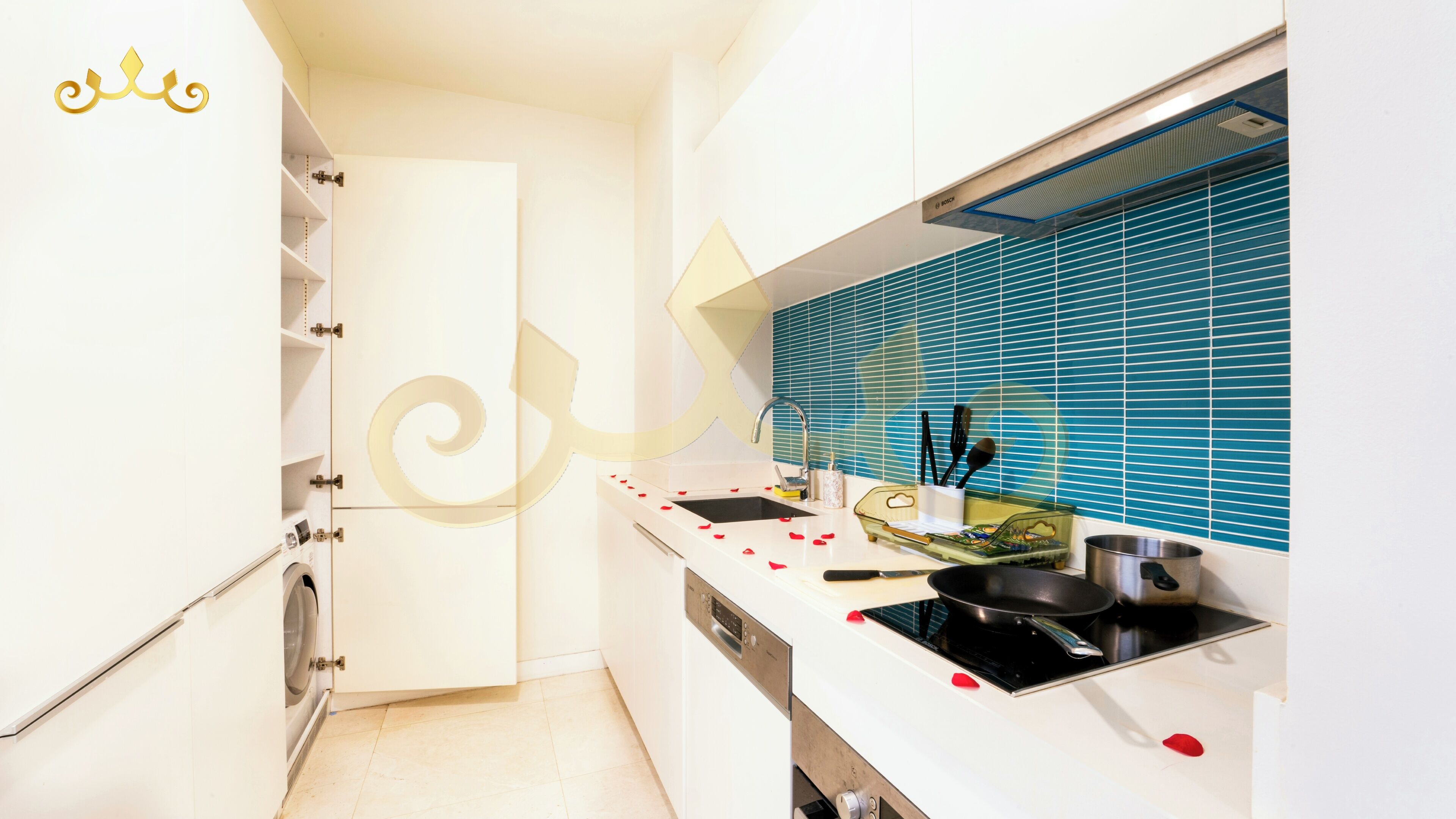 A compact kitchen with a dishwasher, a stove, and a sink.