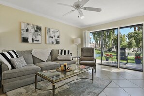 Smart TV, fireplace, books, printers