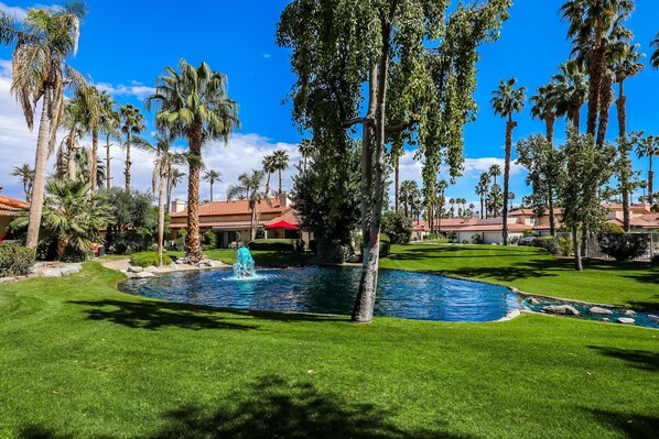 Outdoor pool, a heated pool - Tranquil Setting with amazing water view.  One Story 2 Bedroom condo (Palm Desert)