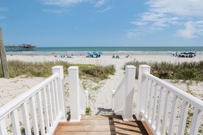 On the beach, sun-loungers, beach towels