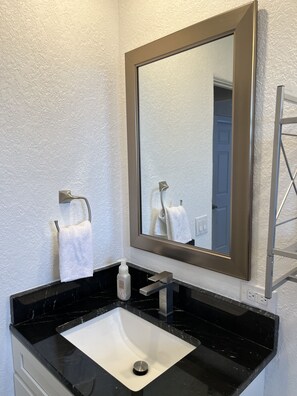 Shower, hair dryer, towels, soap - Cozy Ormond Beach Bungalow home w/ backyard and garage 1 block to the beach (Ormond Beach)
