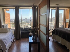 Apartamento familiar | Zona de estar | Una televisión de pantalla plana