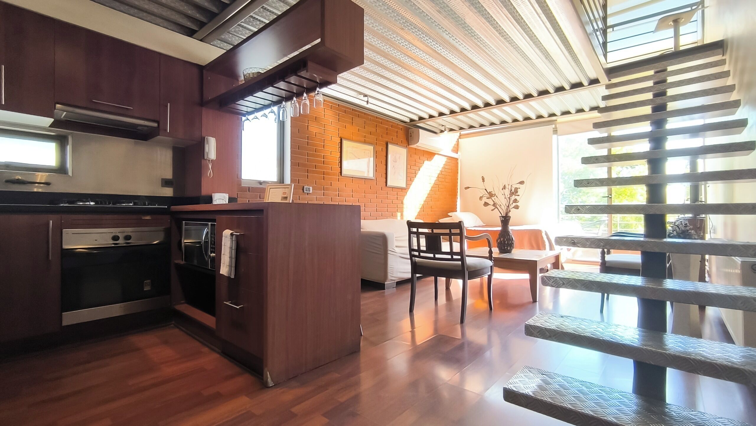 Loft família | Área de estar | TV de tela plana