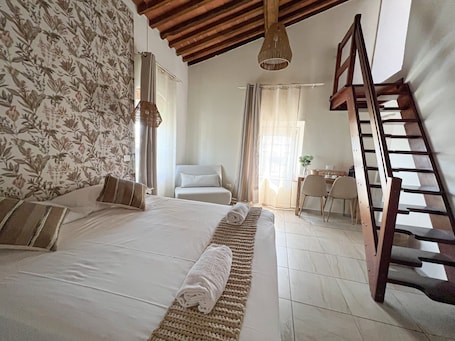 Quarto triplo luxo | Vista para o jardim. VERDERAME Rooms & Suite in Lucca