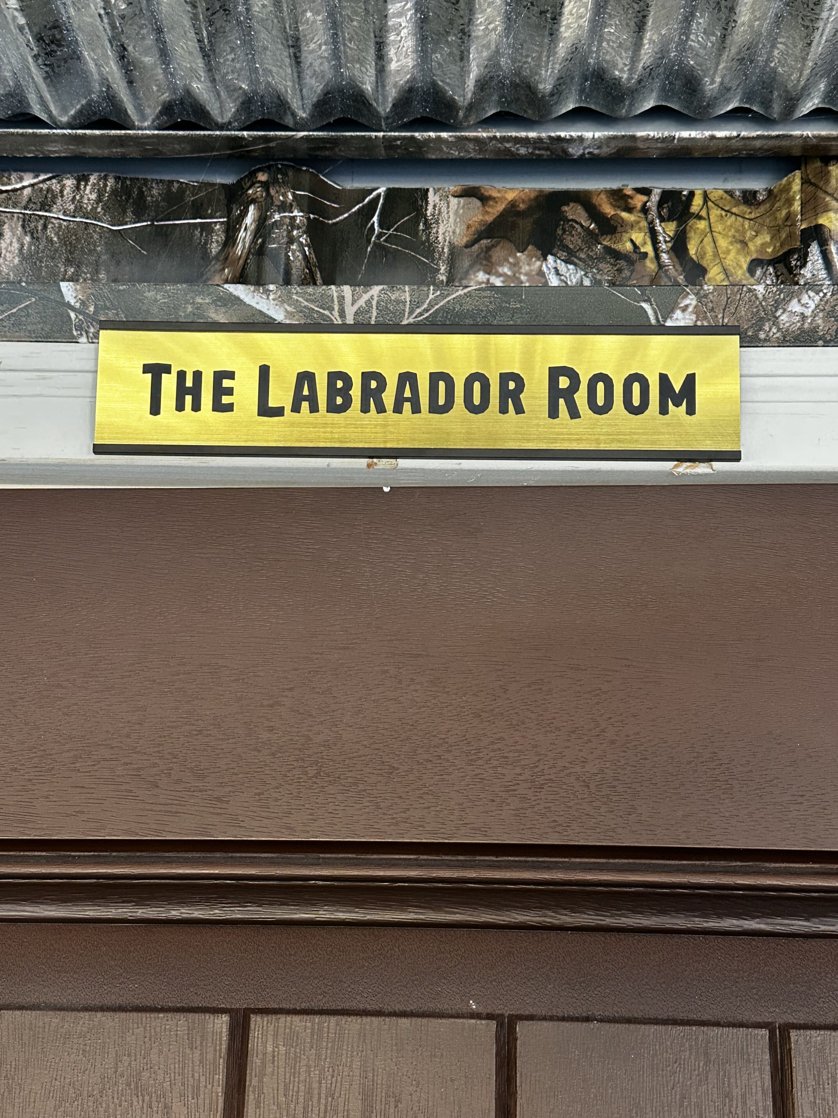 A sign that reads "The Labrador Room".